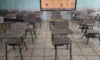 Tapas de botellas se convierte en pupitres